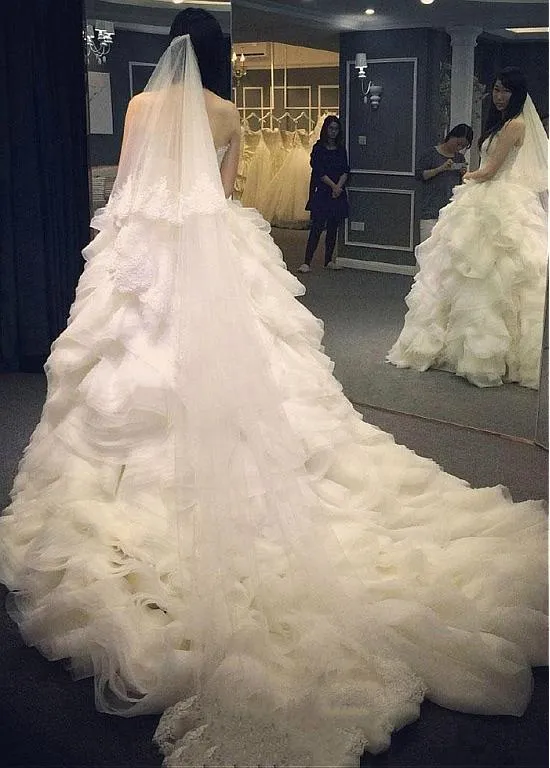 Lace Sweetheart Ball Gown Wedding Dress with Ruffled Organza Skirt